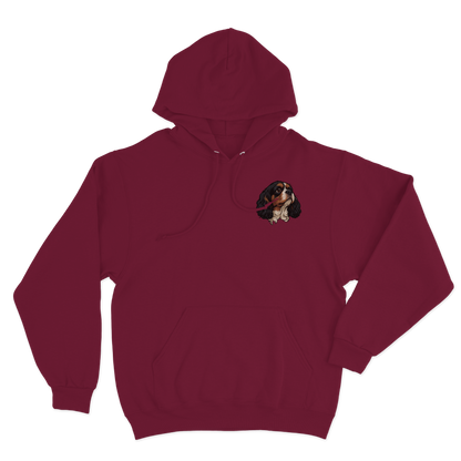 Burgundy hoodie with a custom dog illustration as the logo