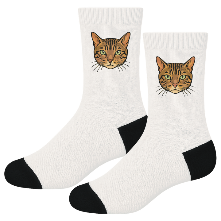 Pair of socks with a cat face illustration on a white background